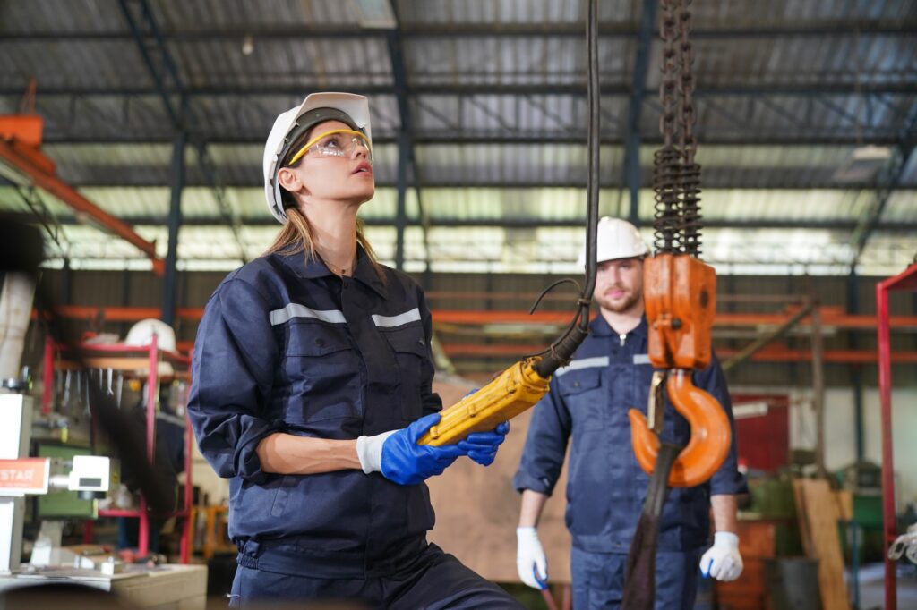 Metal industry worker at factory, Business industry and lathe background.